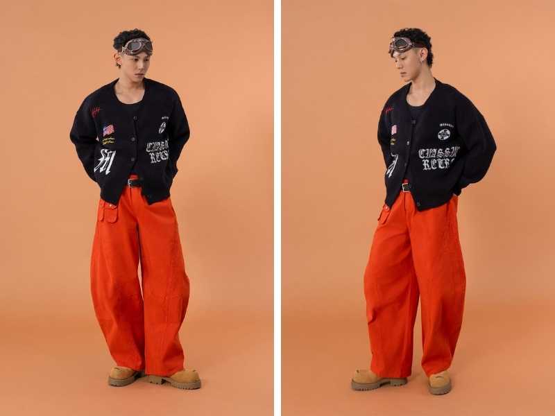 Quần baggy cam phối với áo khoác nam màu đen