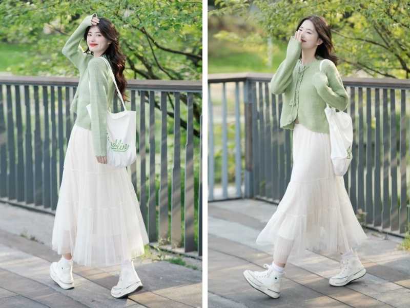 Chân váy trắng phối với cardigan xanh lá